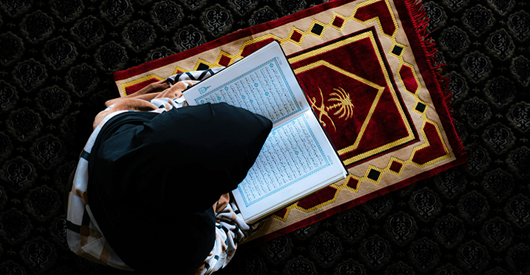 A woman doing da'wah outside her home