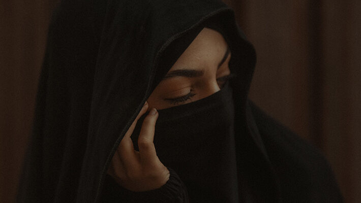 Hijaab in the presence of the husband's step-father