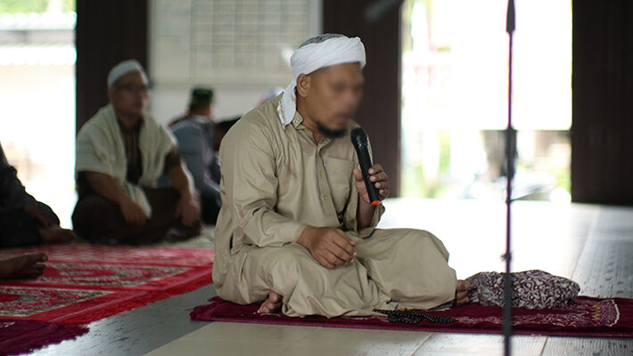 Hiring a reciter to read the Qur.aan upon the soul of the deceased