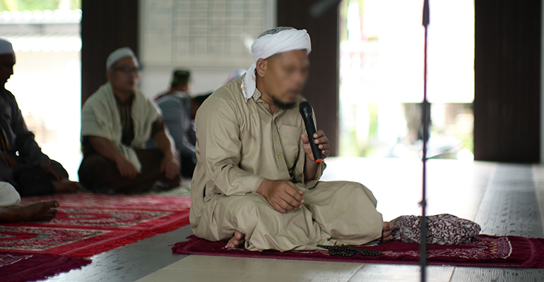 Hiring a reciter to read the Qur.aan upon the soul of the deceased