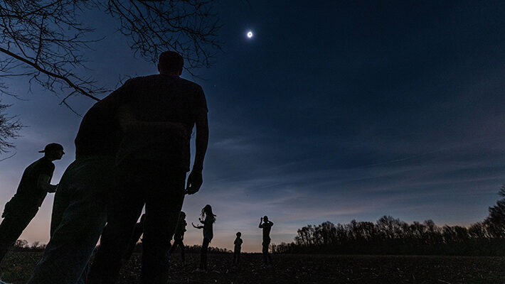 Looking up towards the sky during the eclipse prayer